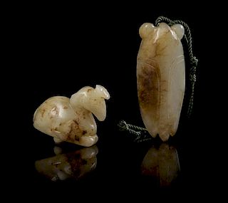 * Two Carved Jade Pendants Length of first 2 1/2 inches.