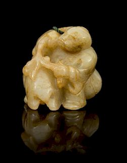 * A Carved Jade Toggle Height 1 1/8 inches.