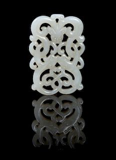 A Reticulated White Jade Dragon Pendant Height 2 1/2 inches.