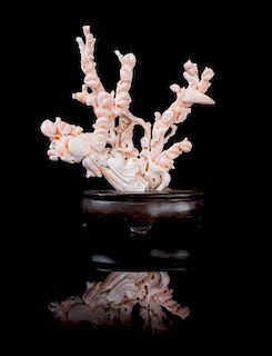 A Carved Coral Figural Group Height 7 inches.