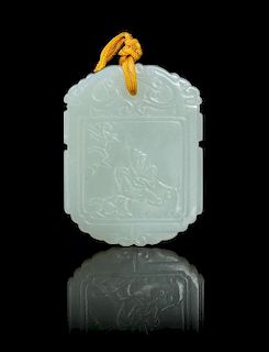 A Carved Celadon Jade Pendant Height 2 inches.