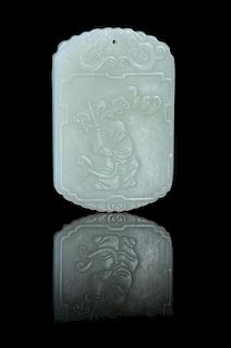 A Carved Pale Celadon Jade Plaque Height 2 1/8 inches.
