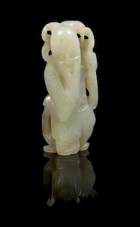 * A Carved Jade Toggle Height of jade 2 1/2 inches.