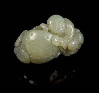 * A Carved Jade Toggle Length 2 3/8 inches.