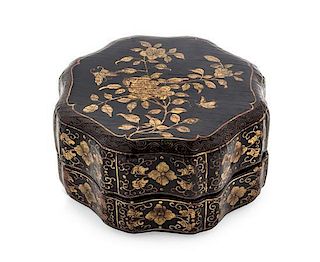 A Gilt Decorated Black Lacquer Box and Cover Width 7 1/2 inches.