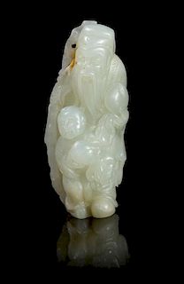 A Celadon Jade Figural Group Height 2 5/8 inches.
