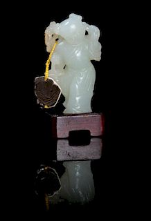 A Carved Jade Toggle Height 2 1/4 inches.
