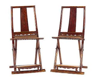 * A Pair of Chinese Elm Folding Chairs 19TH/20TH CENTURY Height 43 inches.