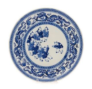 * A Blue and White Porcelain Plate Diameter 81/8 inches.