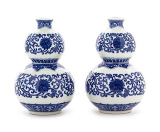 A Pair of Blue and White Porcelain Vases Height 5 3/8 inches.