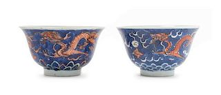 * A Pair of Underglazed Blue and Iron Red Decorated Porcelain Bowls LIKELY 19TH CENTURY Diameter of pair 3 5/8 inches.