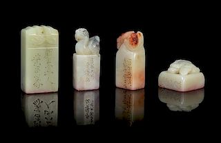 A Group of Four Carved Hardstone Seals Height of tallest 2 1/8 inches.