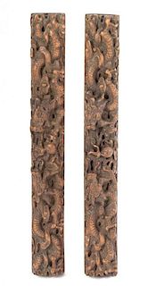 A Pair of Boxwood Scroll Weights Length 12 1/4 inches.