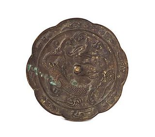 * A Bronze 'Grapevine and Beast' Mirror TANG DYNASTY STYLE Width 5 1/8 inches.