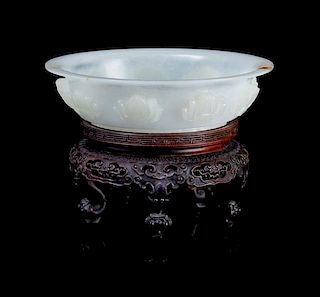 * A Carved Jade Bowl Diameter 5 1/2 inches.