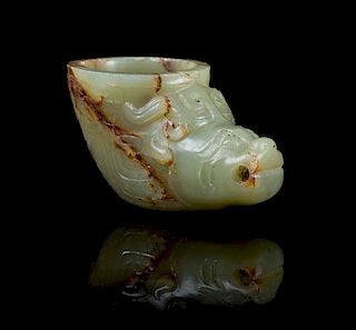 A Celadon Jade Libation Cup Height 1 7/8 inches.