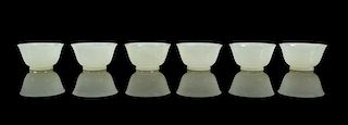 * A Set of Six Jade Cups Diameter of each 2 1/4 inches.