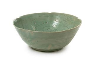 A Japanese Hizen Celadon Glazed Porcelain Bowl POSSIBLY 17TH CENTURY Diameter 13 inches.