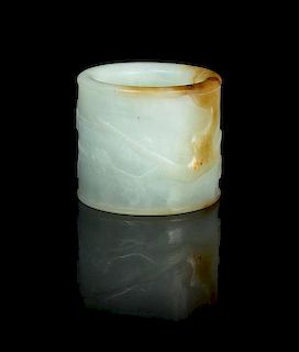 A Carved Jade Archer's Ring Diameter overall 1 1/4 inches.