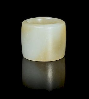 A Celadon Jade Archer's Ring Diameter overall 1 1/4 inches.