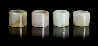 Four Hardstone Archer's Rings Diameter overall of largest 1 1/4 inches.
