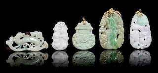 * Five Carved Jadeite Pendants Height of largest 2 1/2 inches.