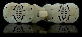 * A Carved Jade Belt Buckle Length 5 1/8 inches.