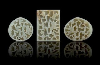 A Group of Three Carved Jade Belt Plaques LIKELY MING DYNASTY Length of largest 2 3/4 inches.