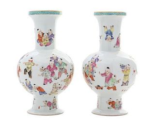 A Pair of Famille Rose Porcelain Vases Height of pair 8 7/8 inches.