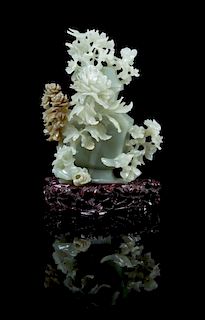 A Carved Jade Vase and Cover 20TH CENTURY Height of jade 7 5/8 inches.