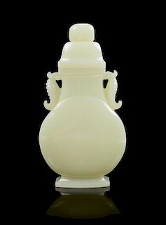 A Celadon Jade Vase and Cover Height 7 1/4 inches.