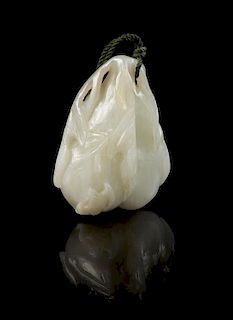 * A Carved Jade Pendant Length 2 1/4 inches.