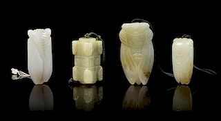 * Four Carved Jade Pendants Length of longest 2 3/4 inches.