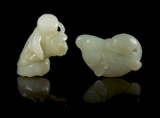 * Two Carved Jade Toggles Length of first 2 inches.