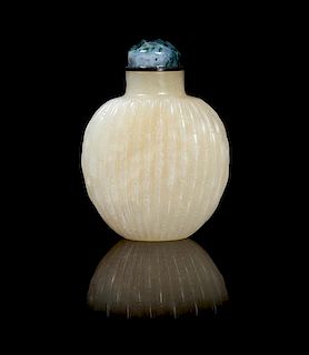 A Jade Snuff Bottle POSSIBLY 19TH CENTURY Height 2 5/8 inches.