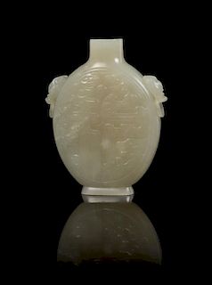 A Carved Jade Snuff Bottle Height 2 3/8 inches.