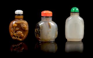 A Group of Three Agate Snuff Bottles POSSIBLY 19TH CENTURY Height of tallest 2 7/8 inches.