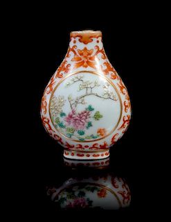 A Famille Rose, Iron Red and Gilt Decorated Porcelain Snuff Bottle Height 2 1/2 inches.
