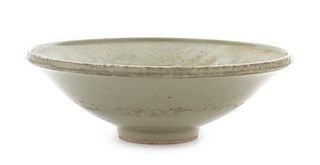 A Korean Light Celadon Glazed Porcelain Bowl Diameter 10 3/4 inches.