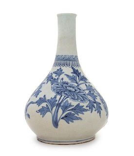 * A Korean Blue and White Porcelain Bottle Vase Height 9 3/4 inches.