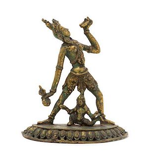 * A Gilt Bronze Figure of a Bodhisattva Height 5 inches.