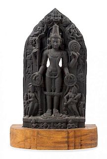 An Indian Red Sandstone Stele of Vishnu Height overall 30 inches.