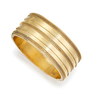 AN ETRUSCAN REVIVAL CUFF/BANGLE, the broad hinged cuff/bang