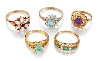 FIVE GEMSET RINGS, to include an 18ct aquamarine ring with 