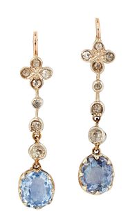 A PAIR OF SAPPHIRE AND DIAMOND EARRINGS, the off-round sapp