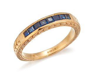A 9CT HALF HOOP SAPPHIRE RING, the half hoop ring with chan