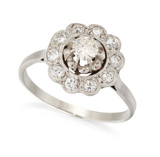 A DIAMOND CLUSTER RING, the central old cut diamond, in a r