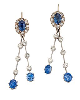 A PAIR OF SAPPHIRE AND DIAMOND EARRINGS, the oval sapphires