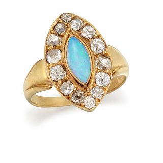AN OPAL AND DIAMOND RING, the marquise opal cabochon in rub
