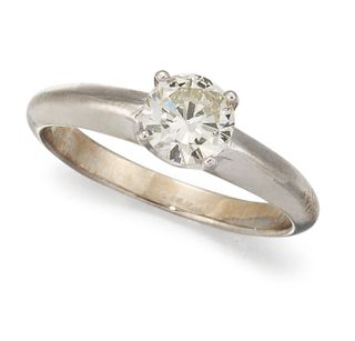 A DIAMOND SOLITAIRE RING, the round brilliant cut diamond, 